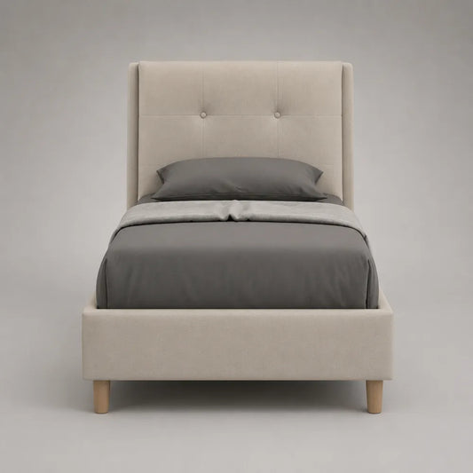 Letto singolo 90 x 200 cm struttura imbottita con testiera trapuntata MDF colore beige gambe in legno naturale chiaro